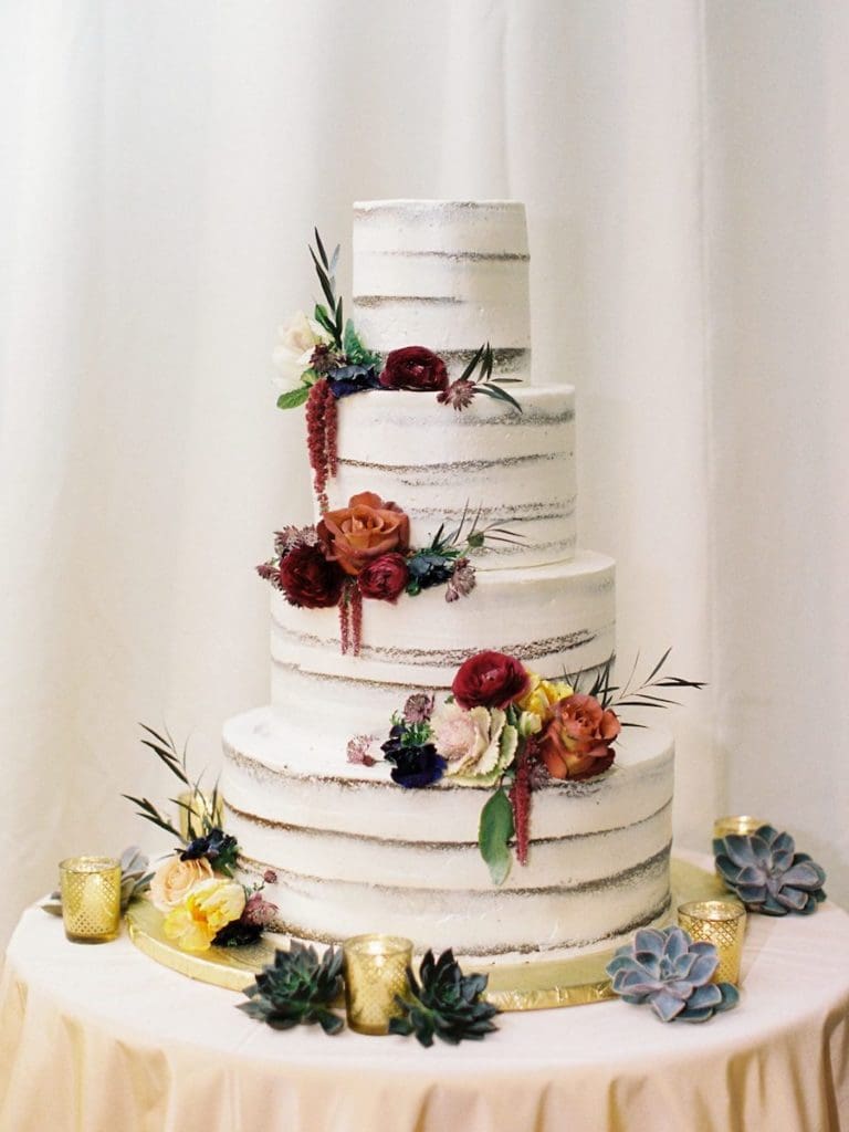 wedding stacked cake with flowers