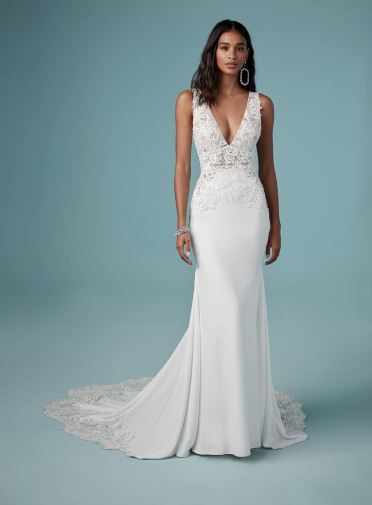 Maggie Sottero fit-and-flare gown crepe fabric with plunging neckline and laces on top and train gretchens bridal gallery indianapolis