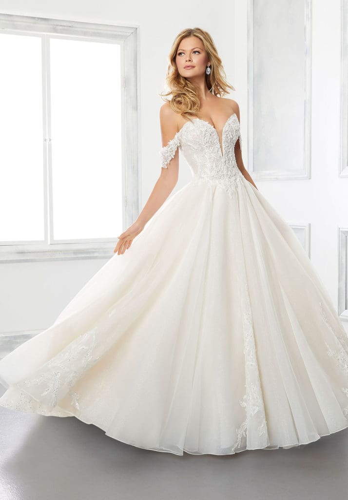 Morilee Ball Gown with off the shoulder straps, sparkle skirt blush color, and sparkle vine appliques