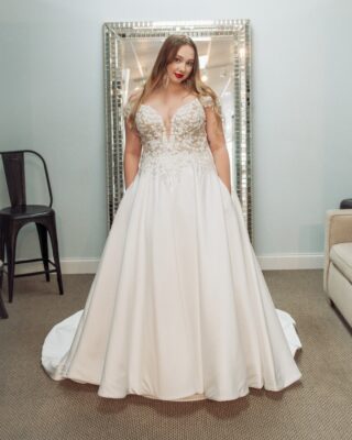 This ball gown has off the shoulder sleeves, lace bodice, with a beautiful satin skirt. Don't forget about the pockets! 

Gown pictured: Vivi by @allurebridals 

#offtheshoulderdress #indybride #satinballgown #indianapolis #2023bride